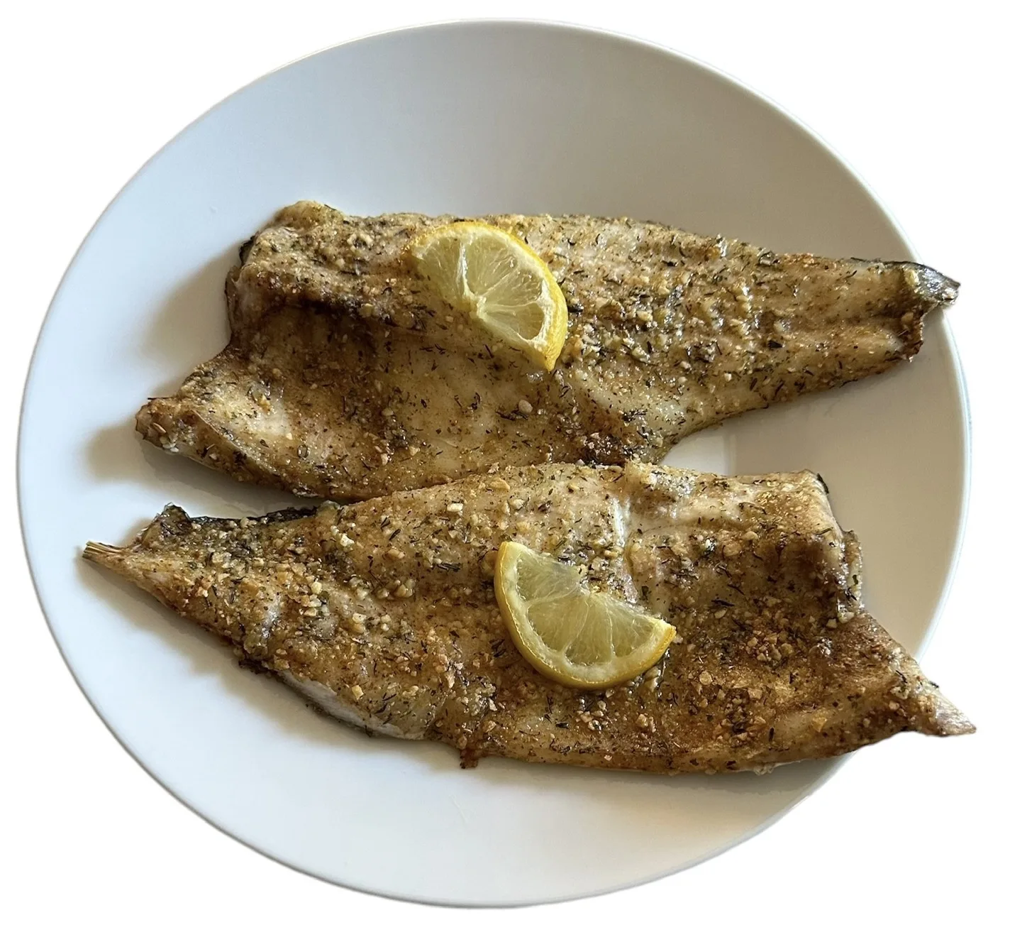 Lubina al horno con ajo, perejil y limón