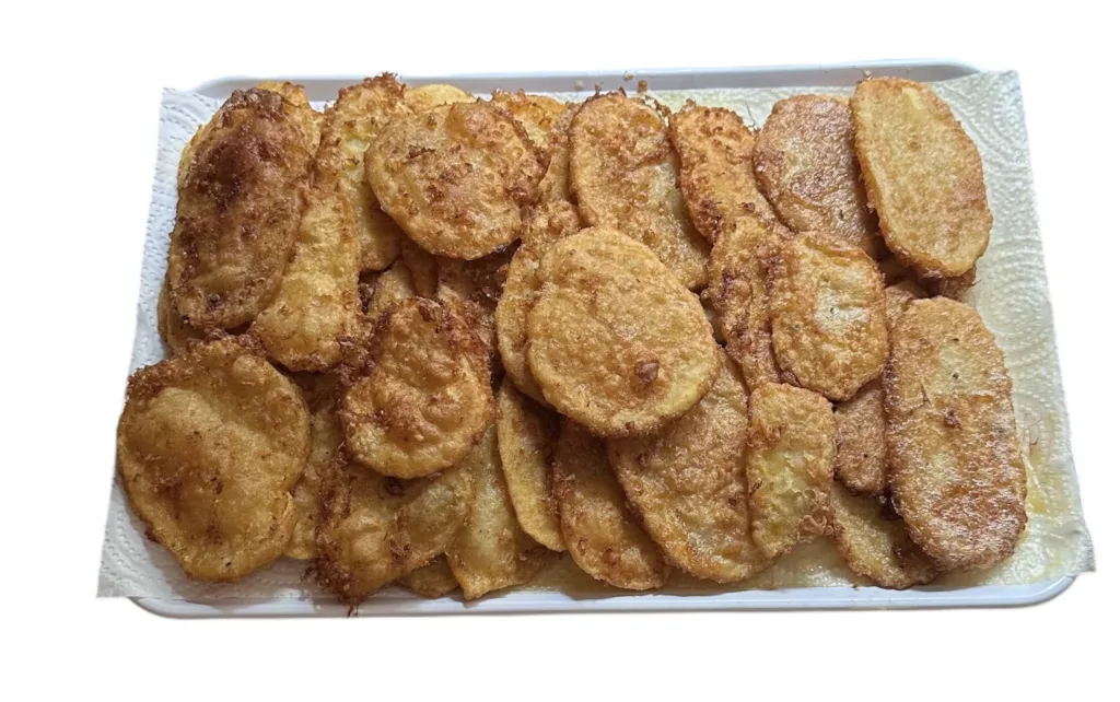 Patatas a la importancia: receta tradicional paso a paso ilustración