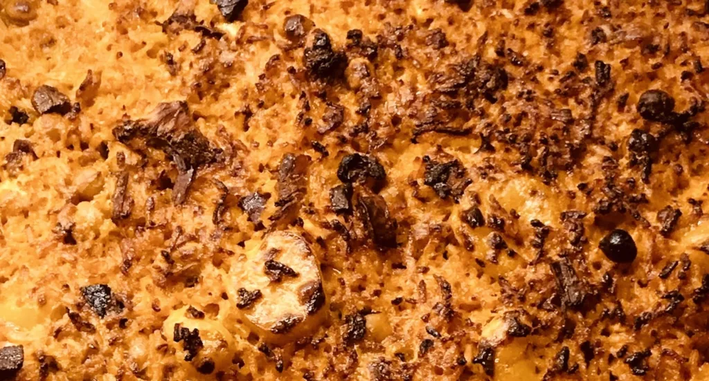 Arroz al Horno con Costra: Plato Tradicional de Alicante ilustración