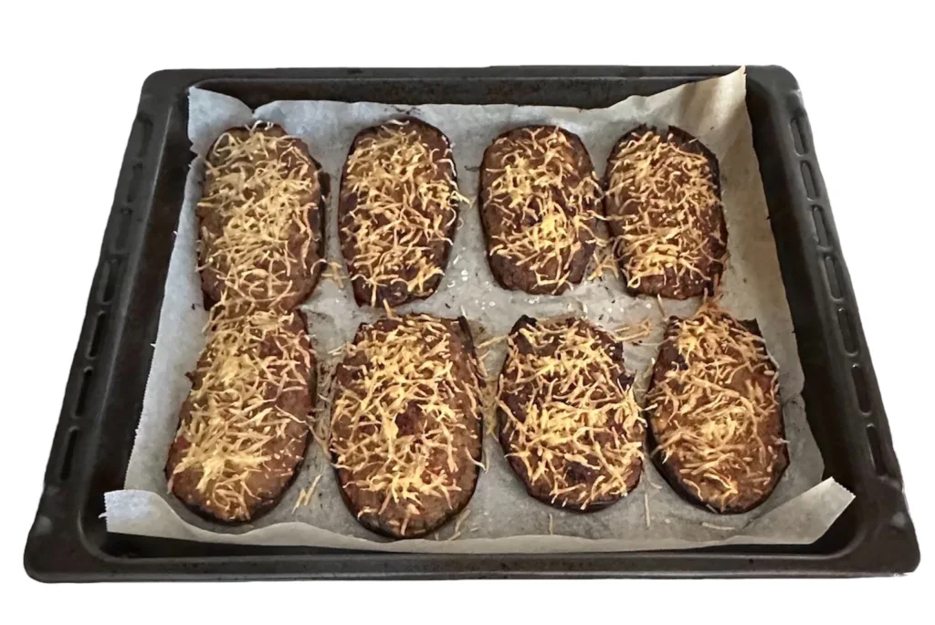 Cómo Hacer Berenjenas Rellenas de Carne con Queso Gratinado ilustración